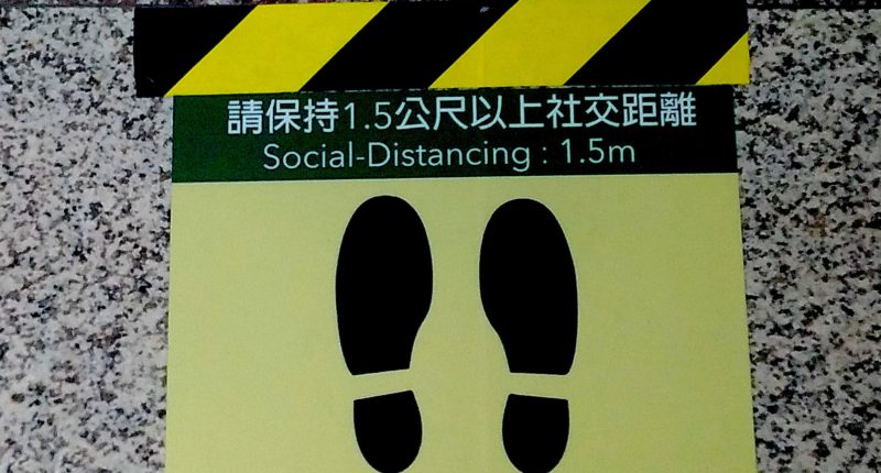 Social Distancing sign at Songshan Airport in Taipei